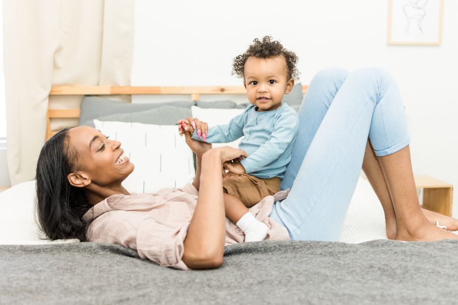 The Mother Act - parent playing with child